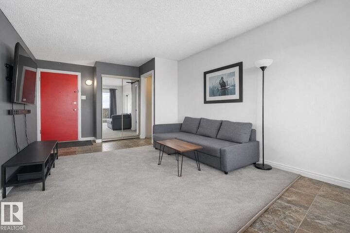 Property Photo: 5125 Riverbend Road NW 407 AB T6H 5K5