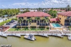 Property Photo:  1400 Blue Point Avenue 207  FL 34102 