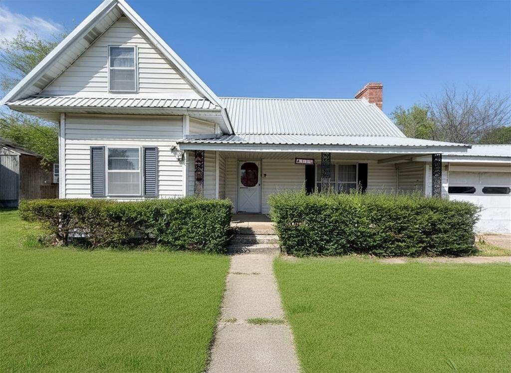 Photo de la propriété: 411 E Avenue G TX 76065