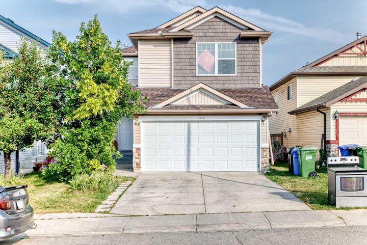 Property Photo: 16062 Everstone Road SW AB T2Y 4J7