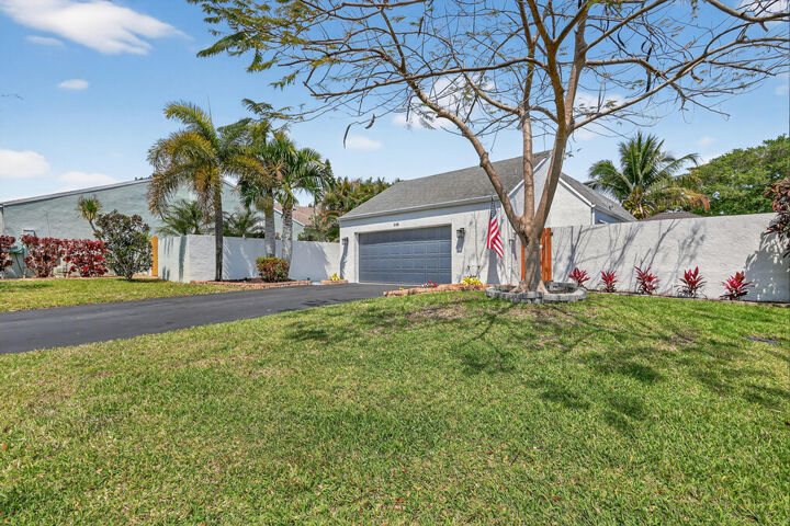 Property Photo: 2145 NW 10th Street FL 33445