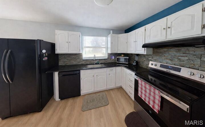 Property Photo:  753 Boulevard De Cannes  IL 62025 