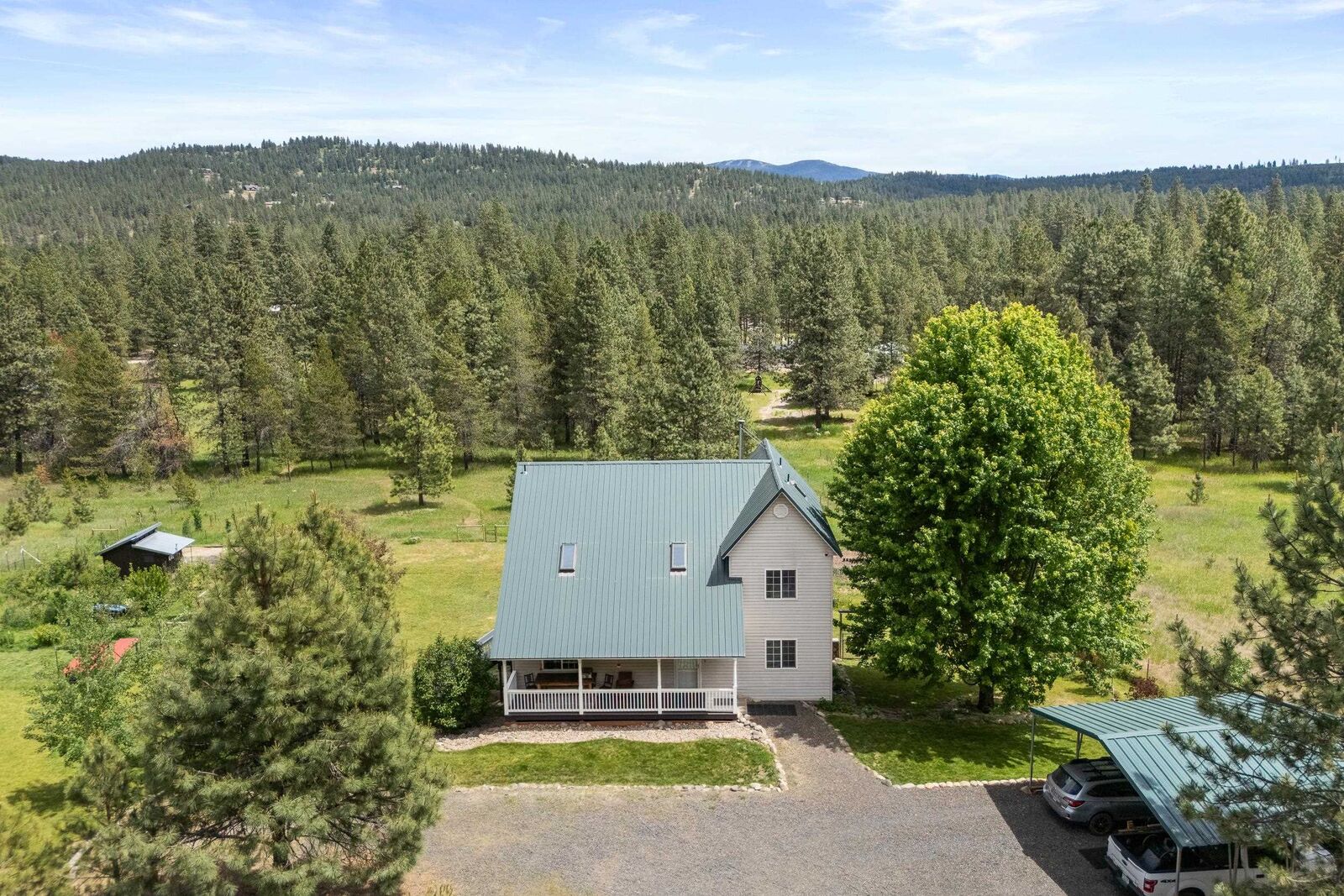 Property Photo:  32626 N Milan Rd  WA 99003-8855 