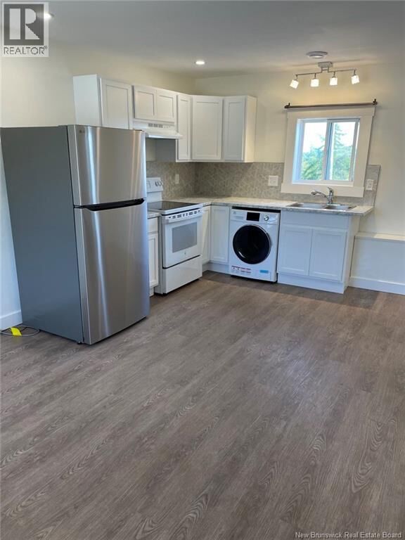 Property Photo:  2144,2149 Ocean Westway  NB E2M 5H6 