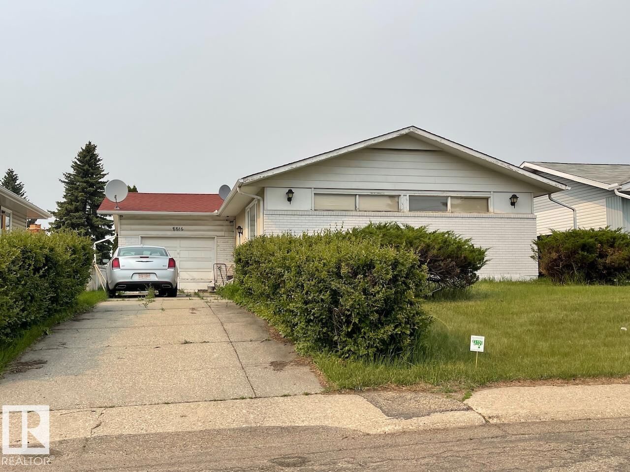Property Photo: 8816 137 Avenue NW AB T5E 1Y4