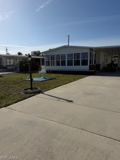 Property Photo:  210 Pine Key Ln 210  FL 34114 