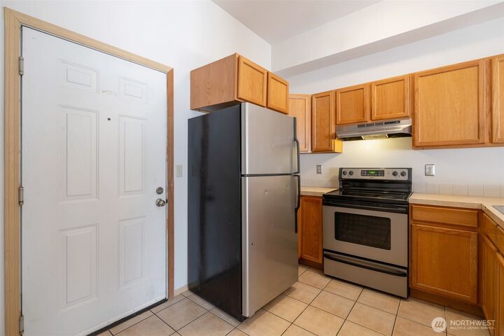 Property Photo:  11424  1st Avenue S 103  WA 98168 