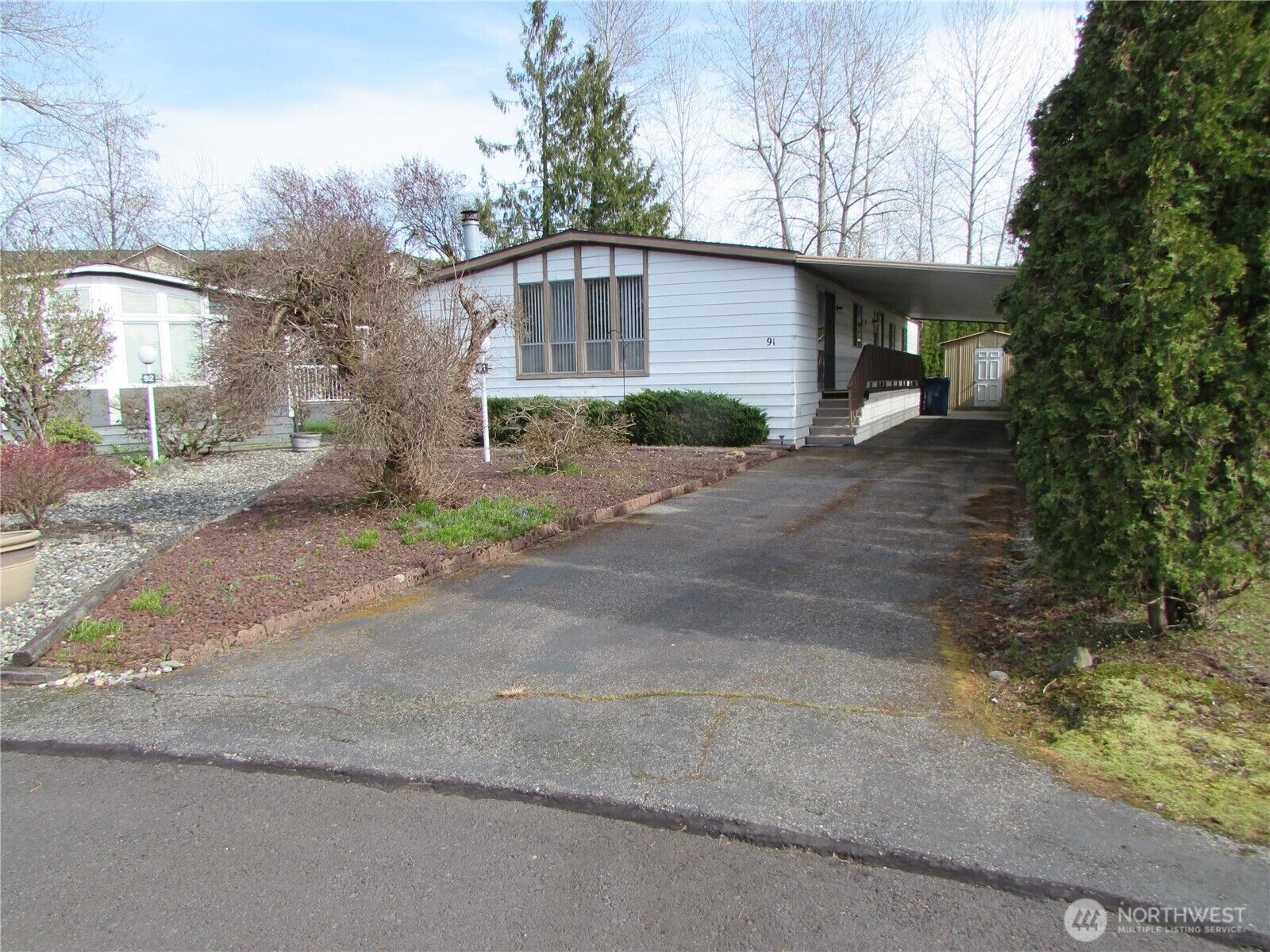Property Photo:  5900  64th Street NE Sp 91  WA 98270 