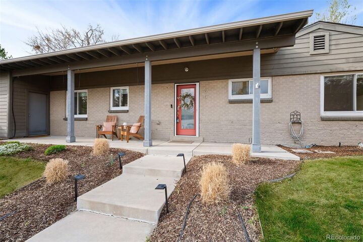 Property Photo:  901 Glencoe Street  CO 80220 