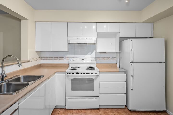 Property Photo: 1200 Eastwood Avenue 212 BC V3B 7R9
