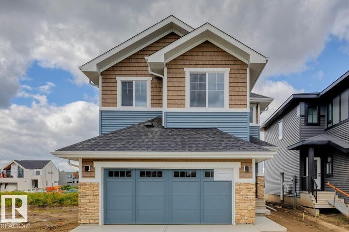 Property Photo: 5132 Cawsey Bend SW AB T6W 5M8
