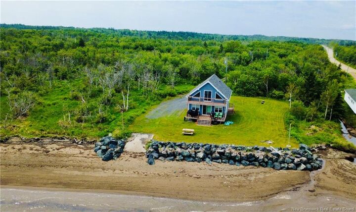 Property Photo: 85 Allée Pigeon Beach NB E8T 2T1