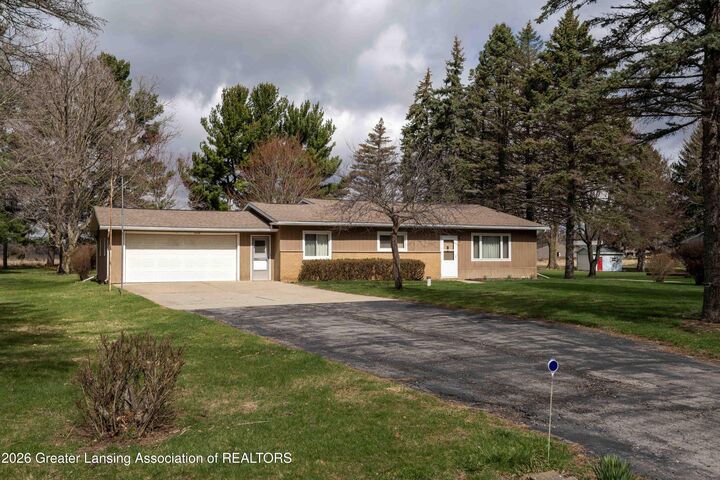 Property Photo:  9230 Looking Glass Brook Drive  MI 48837 