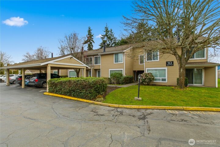 Property Photo:  23712  13th Place S 1006  WA 98198 