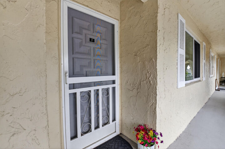 Property Photo:  13767 Flora Place F  FL 33484 