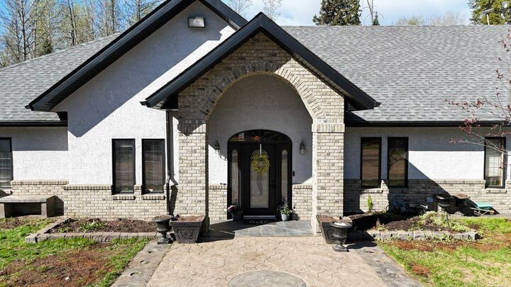 Property Photo: 590072 Range Road 113A AB T7S 1P8