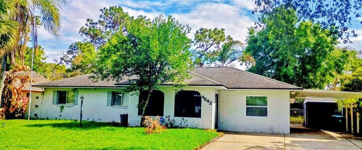 Property Photo:  4842 Beacon Street  FL 32808 