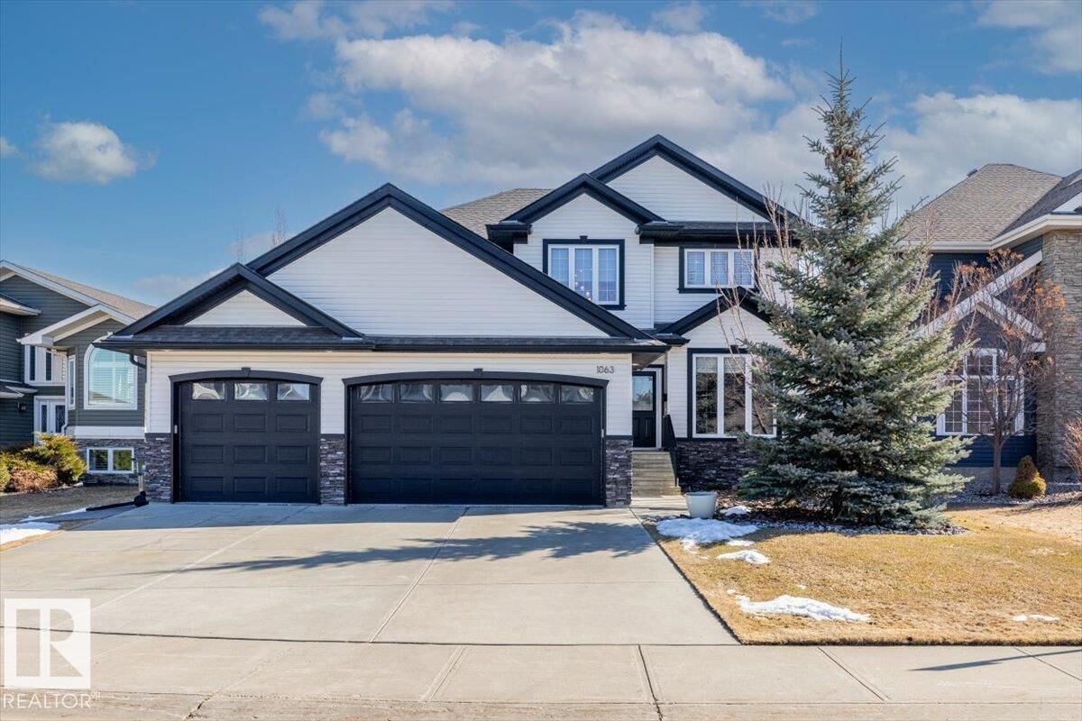 Property Photo:  1063 Summerwood Estates Road  AB T8H 0E2 
