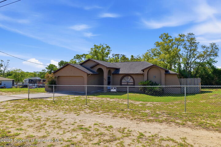 Property Photo:  10464 Maderia Street  FL 34608 