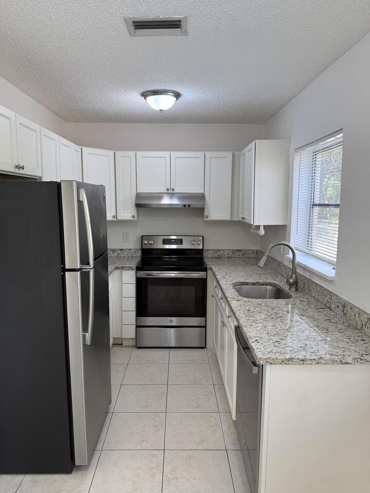 Property Photo:  6575 NE 7th Avenue  FL 33487 