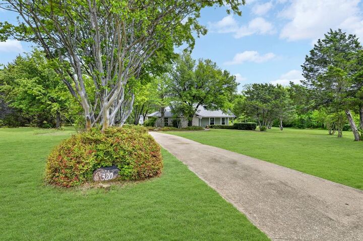 Property Photo:  320 Cedar Hill Circle  TX 75407 