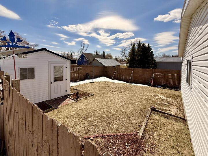 Property Photo:  305 Cedar Street  MI 49721 
