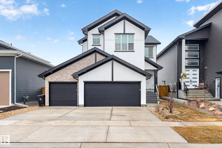 Property Photo:  345 Meadowview Drive  AB T8L 0Y4 