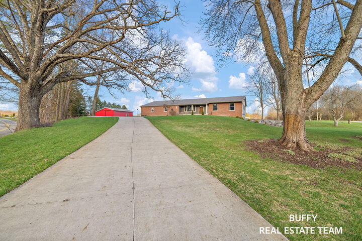 Property Photo:  7500 Tiffany Avenue NE  MI 49341 