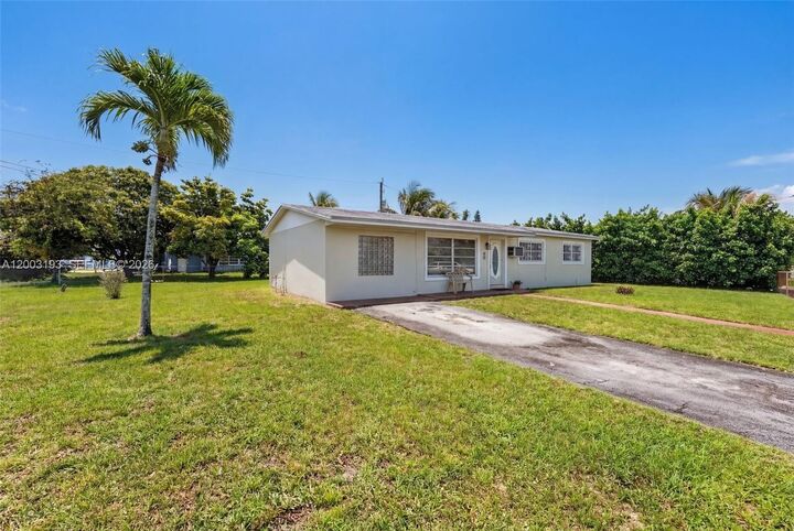Property Photo:  20621 NW 24th Ct  FL 33056 