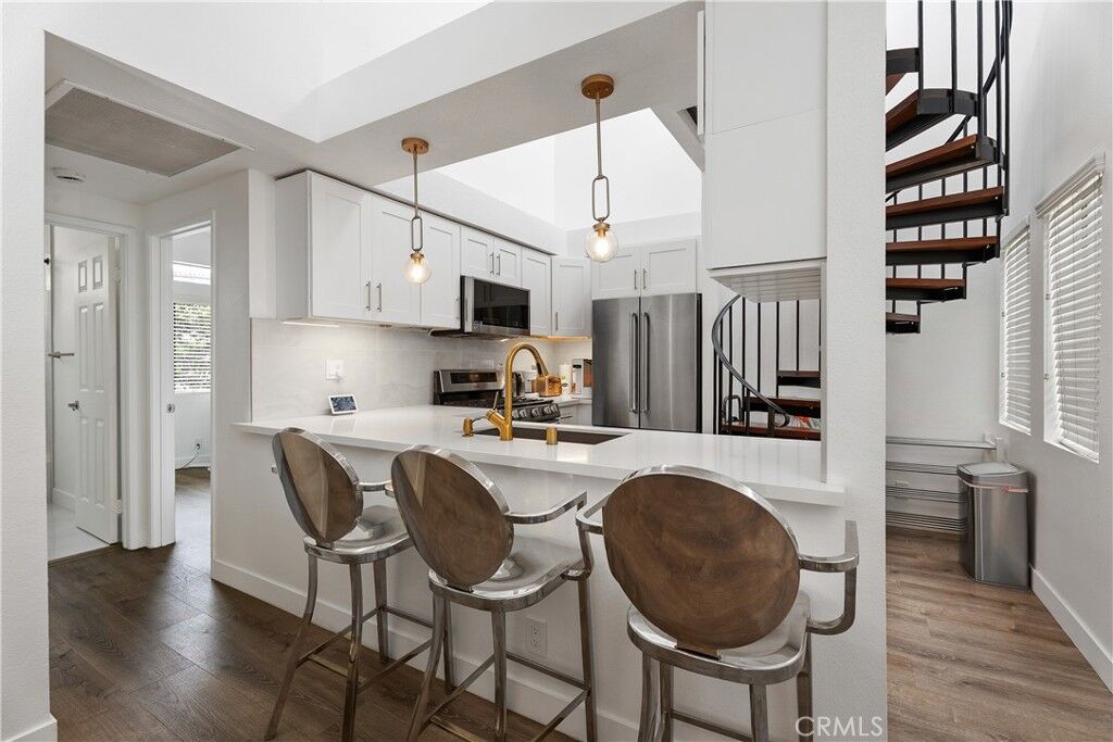 Property Photo:  17172 Abalone 211  CA 92649 