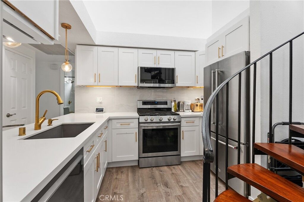 Property Photo:  17172 Abalone 211  CA 92649 