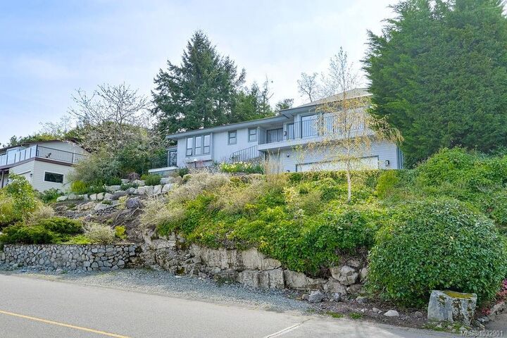 Property Photo:  8870 Forest Park Dr  BC V8L 4E9 