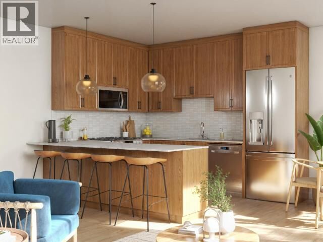 Property Photo:  204-5191 Manson Ave  BC V8A 3P2 