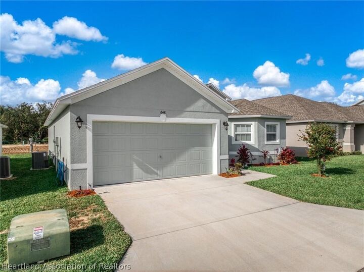 Property Photo:  648 W Carmichael Street  FL 33825 