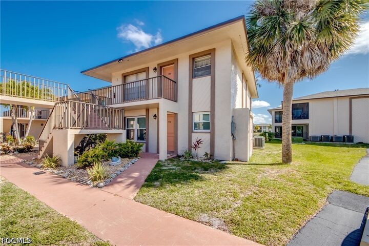 Property Photo:  16881 Davis Road 116  FL 33908 