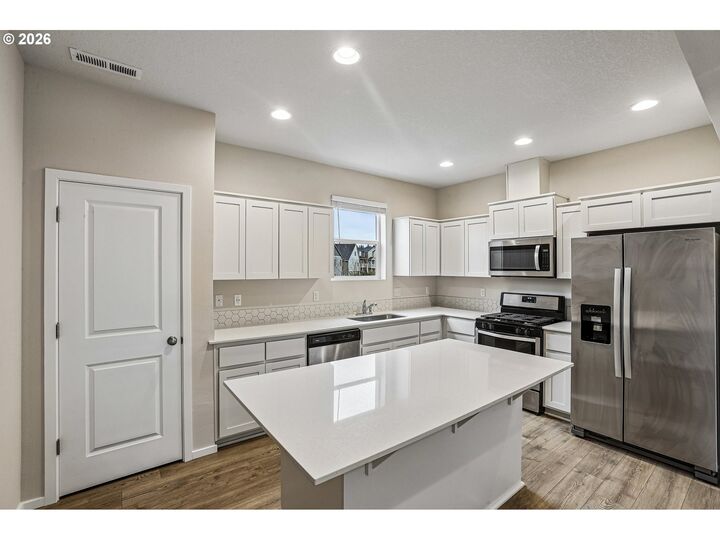Property Photo:  7803 NW Spirea St  OR 97229 