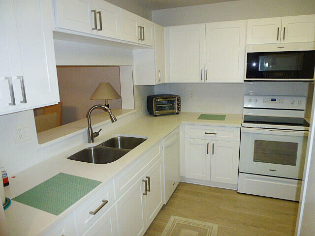 Property Photo:  5550 Witney Drive 308  FL 33484 