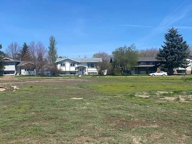 Property Photo:  113 Upland Boulevard W  AB T1R 1C5 