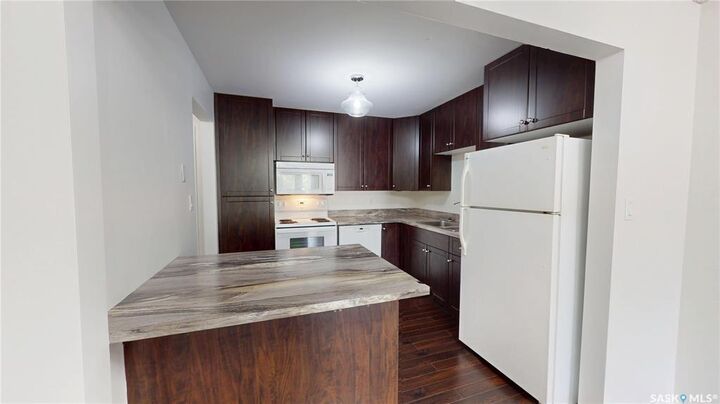 Property Photo: 921 Main Street 203 SK S7H 0K4