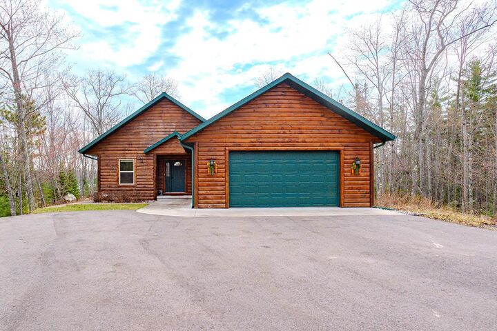 Property Photo:  4387 Double Oaks Trail  WI 54501 