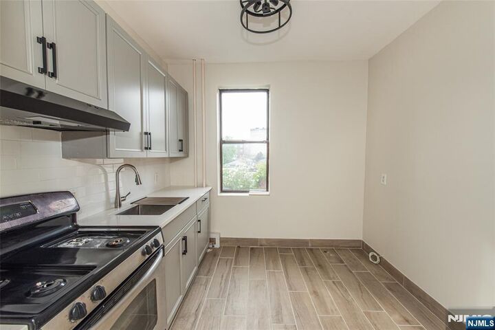 Property Photo:  7111 Palisade  NJ 07047 