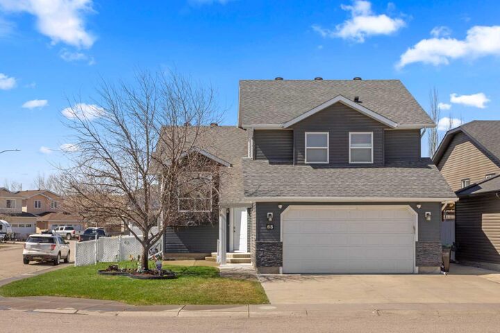Property Photo: 65 Canoe Circle SW AB T4B 2L6