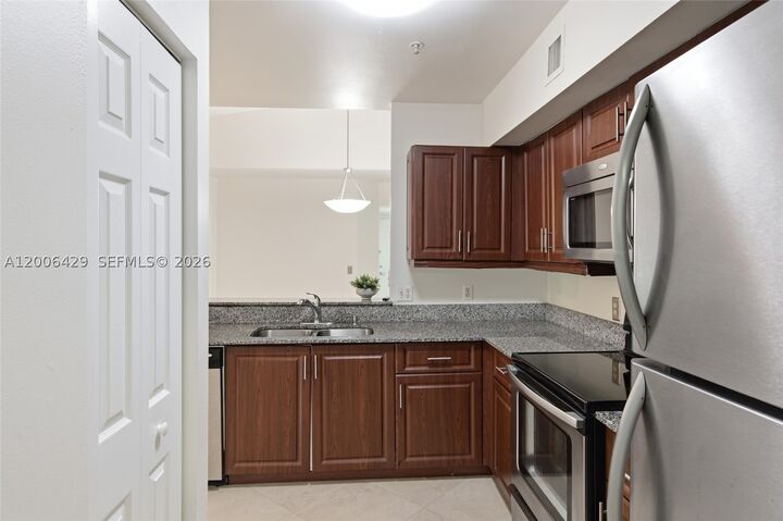 Property Photo:  2451 Centergate Dr 303  FL 33025 