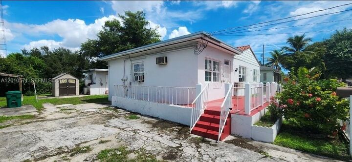 Property Photo:  405 NW 64th St 3  FL 33150 