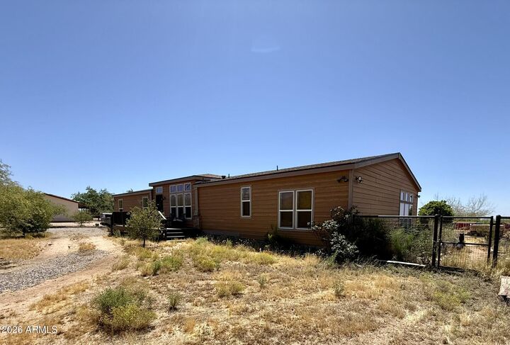 Property Photo:  22455 W Hylton Way  AZ 85332 