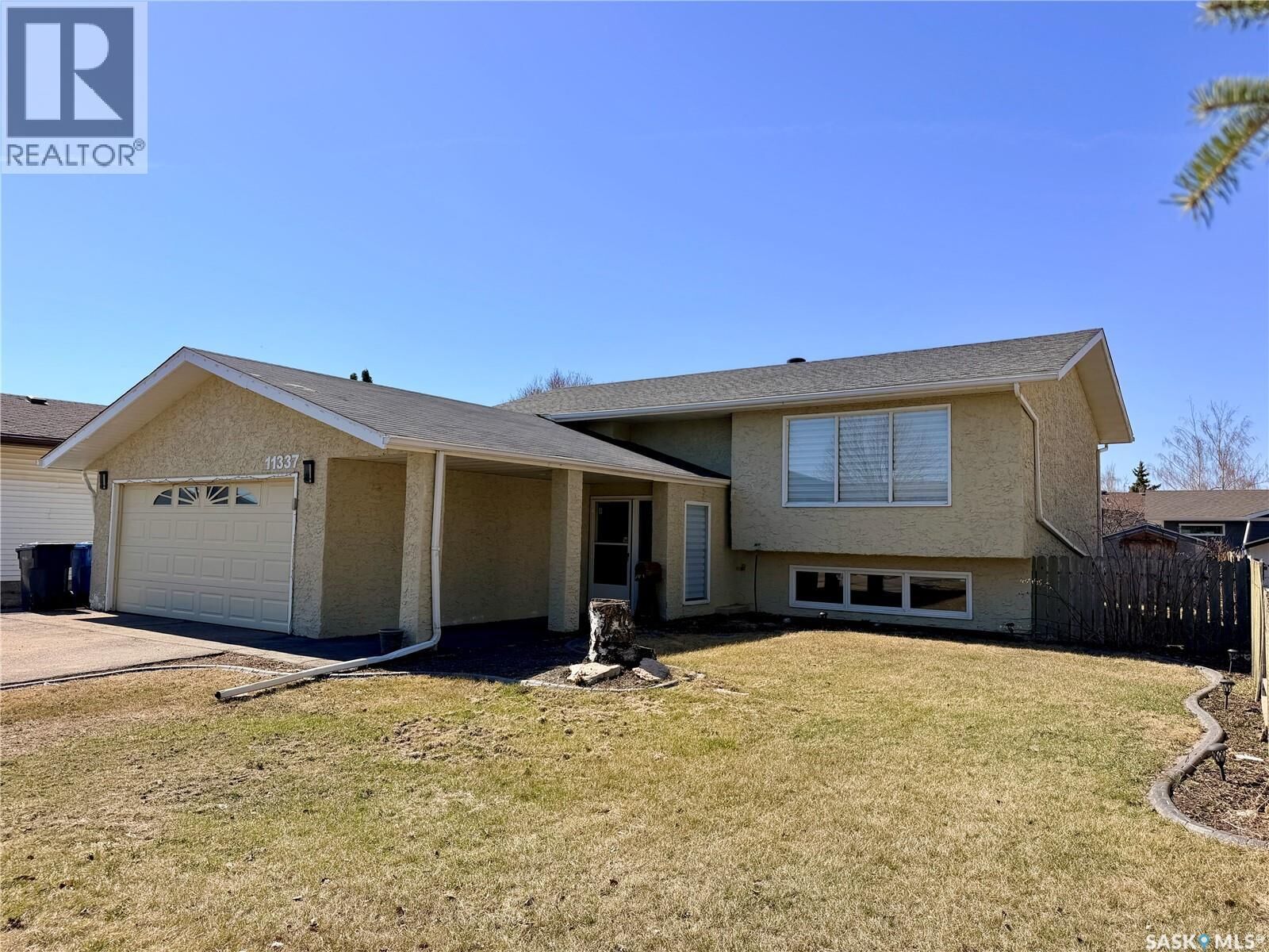 Property Photo:  11337 Clark Drive  SK S9A 3P5 