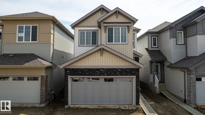 Property Photo: 20837 15A Avenue NW AB T6M 3N8