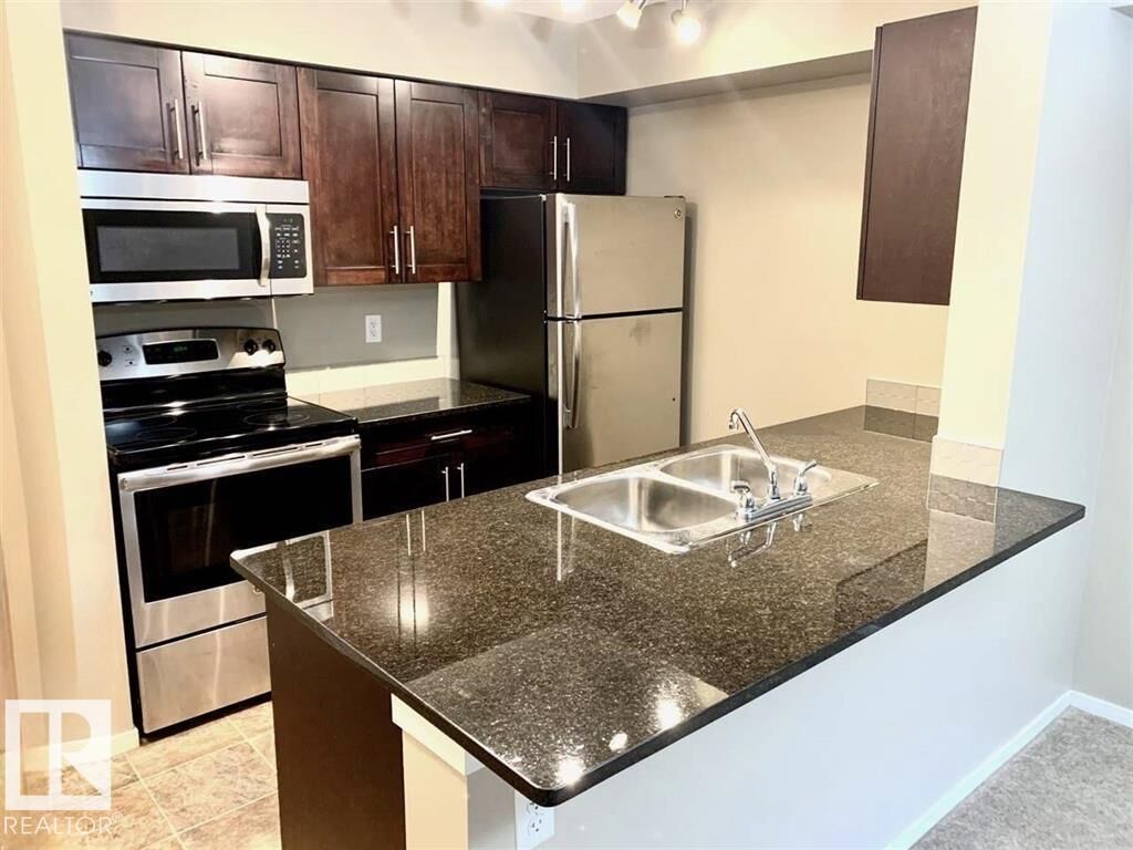 Property Photo: 3207 James Mowatt Trail SW 114 AB T6W 3L6