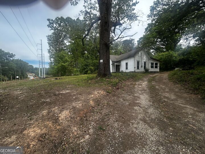 Property Photo:  4854 Stonewall Tell Road SW  GA 30349 