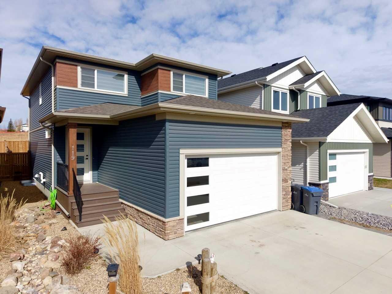 Property Photo: 119 Crestview Boulevard AB T4S 0V8